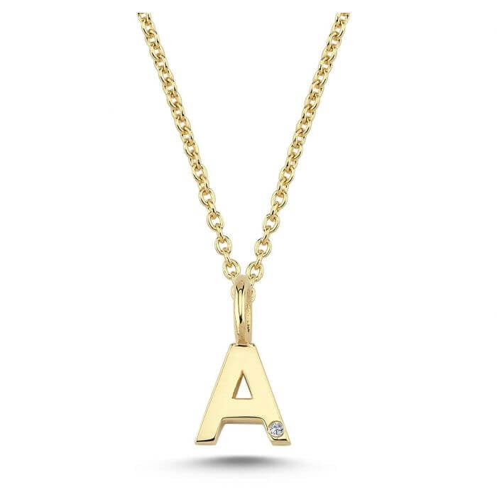Nuran. 14 kt guldbogstav med diamant