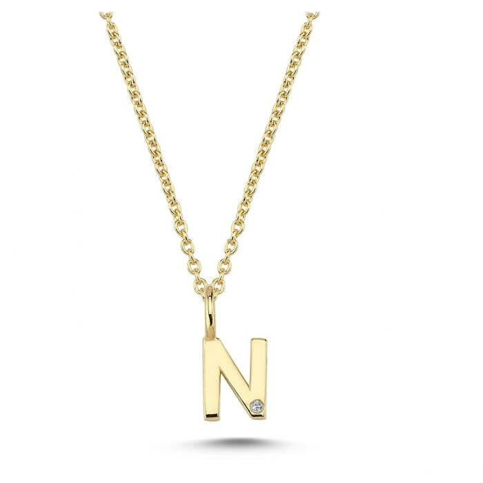 Nuran. 14 kt guldbogstav med diamant