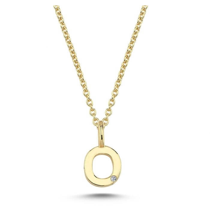 Nuran. 14 kt guldbogstav med diamant