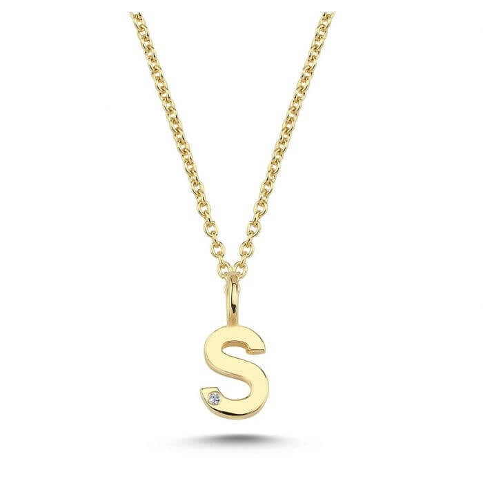 Nuran. 14 kt guldbogstav med diamant
