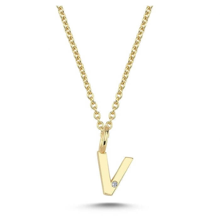 Nuran. 14 kt guldbogstav med diamant